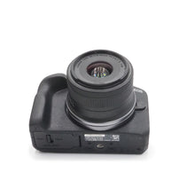 Load image into Gallery viewer, Canon R100 24.1 MP Mirrorless Camera with 18-45mm Lens - USED