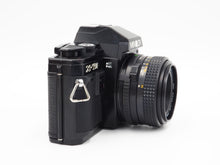 Load image into Gallery viewer, Minolta X-7A with 50mm f/2.0 Lens - USED
